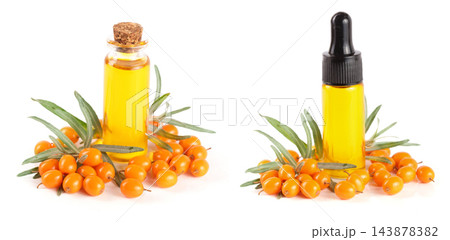 Sea-buckthorn oil with berries and leaves isolated on white background 143878382