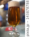 Cold Beer Served in a Glass Mug with Golden Color and Foam Cold Beer Served in a Glass Mug with Golden Color and Foam 143878788