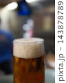Cold Beer Served in a Glass Mug with Golden Color and Foam Cold Beer Served in a Glass Mug with Golden Color and Foam 143878789