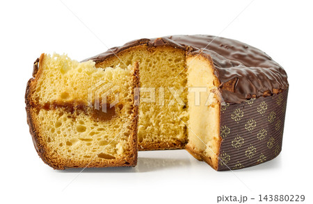 Panettone with caramel covered with chocolate isolated on white background Panettone with caramel covered with chocolate isolated on white background 143880229