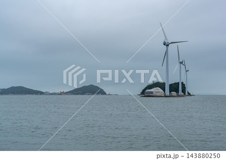 Three Wind Turbines on a Small Coastal Island Three Wind Turbines on a Small Coastal Island 143880250