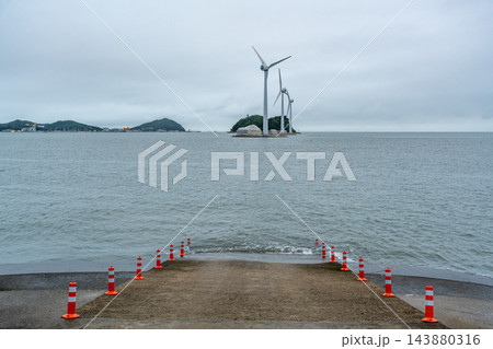 Coastal Boat Ramp Facing Three Wind Turbines Coastal Boat Ramp Facing Three Wind Turbines 143880316