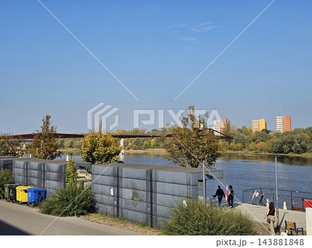 Warsaw, Poland - October 7, 2026: Sunny Vistula River Promenade With Autumn Trees in Warsaw 143881848