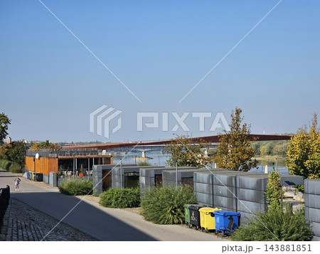 Warsaw, Poland - October 7, 2026: Landscaped Vistula Waterfront With Trees and Low Buildings 143881851