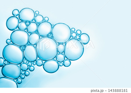 Abstract Blue Water Bubbles on a Clean Light Background Abstract Blue Water Bubbles on a Clean Light Background 143888181