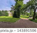 The Temple of Friendship and a small bridge amidst the greenery of Pavlovsk Park in summer. Pavlovsk. Saint Petersburg. Russia. 143891506