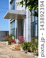 Modern Building Entrance Decorated with Bougainvillea Modern Building Entrance Decorated with Bougainvillea 143892394