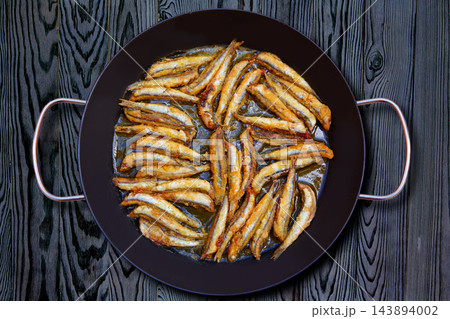 Boquerones fritos Mediterranean fried anchovies Boquerones fritos Mediterranean fried anchovies 143894002