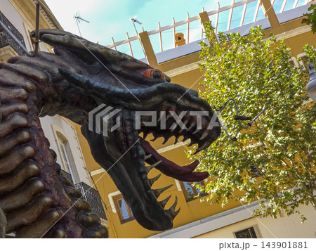 Close Up of Large Fierce Dragon Head Sculpture in Historic Town 143901881