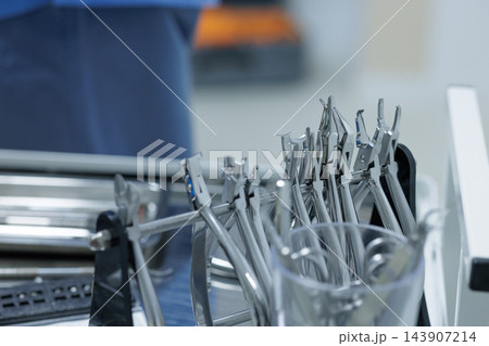 Dental instruments arranged in a treatment unit represent advanced dentistry, clinical precision, and professional equipment for oral healthcare campaigns. 143907214