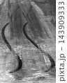 Black tire mark on race track from race car burnout skid mark, Skid marks on asphalt road surface, Curved black tire skid marks. 143909333