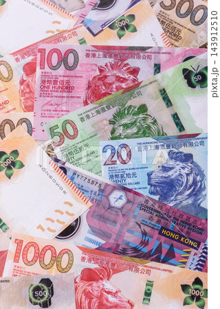 Hong Kong paper money, dollar banknotes and cent coins as currency for exchange or travel Hong Kong paper money, dollar banknotes and cent coins as currency for exchange or travel 143912510