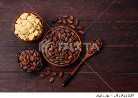 Roasted or raw cacao beans for making powder and chocolate. Cacao beans 143912634
