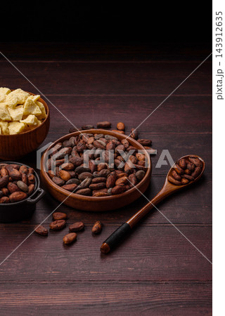 Roasted or raw cacao beans for making powder and chocolate. Cacao beans Roasted or raw cacao beans for making powder and chocolate. Cacao beans 143912635