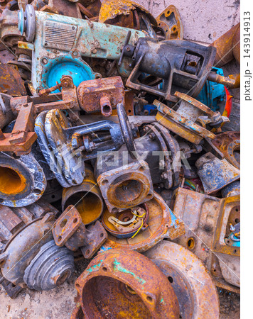 Close-Up of Rusty Scrap Metal Industrial Parts Pile 143914913