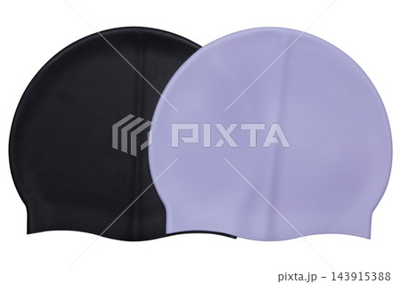 Black and purple silicone swim caps isolated on white background stock photo 143915388