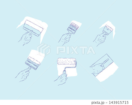 Hand with wall construction tools paint roller, putty knife light blue Hand with wall construction tools paint roller, putty knife light blue 143915715