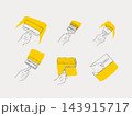 Hand with wall construction tools paint roller, putty knife yellow 143915717
