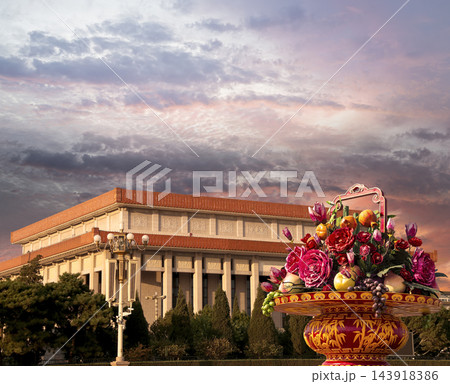 Mausoleum of Mao Zedong and huge flower basket (against the sunset), Tiananmen Square, Beijing, China Mausoleum of Mao Zedong and huge flower basket (against the sunset), Tiananmen Square, Beijing, China 143918386