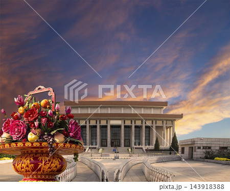 Mausoleum of Mao Zedong and huge flower basket (against the sunset), Tiananmen Square, Beijing, China 143918388