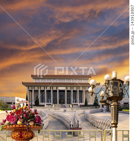 Mausoleum of Mao Zedong with street lamp and huge flower basket (against the sunset), Tiananmen Square, Beijing, China Mausoleum of Mao Zedong with street lamp and huge flower basket (against the sunset), Tiananmen Square, Beijing, China 143918907
