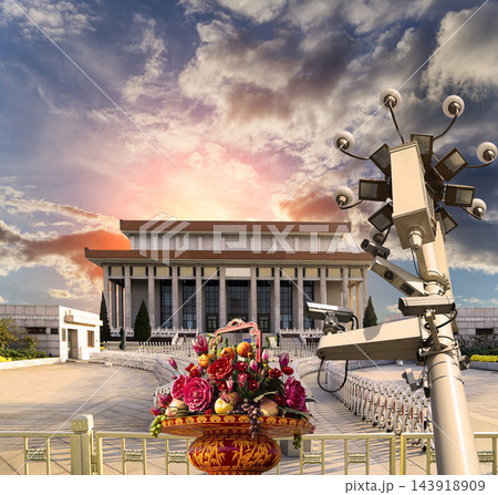 Mausoleum of Mao Zedong with street lamp and huge flower basket (against the sunset), Tiananmen Square, Beijing, China 143918909