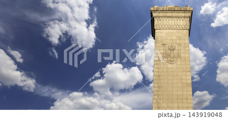 Monument to the People's Heroes at the Tiananmen Square (against the sky with clouds), Beijing, China. Translation of the inscription on the monument: Eternal glory to the people's heroes... 143919048