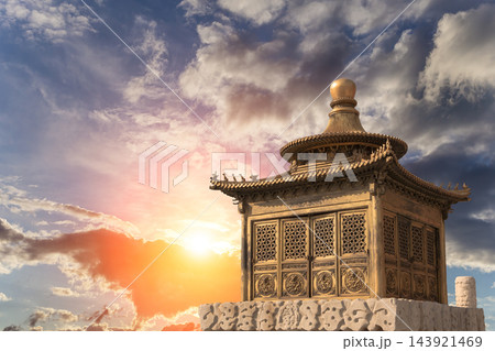 Ancient bronze pagoda (against the sunset) in the Forbidden City (Palace museum), the Chinese imperial palace from the Ming dynasty to the end of the Qing dynasty (1420 to 1912). Beijing, China 143921469
