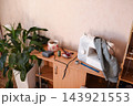 A fashion designer's workspace with a sewing machine in the studio 143921553