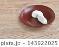 mochi stuffed vanilla milk ice cream half cut arranging on plate 143922025