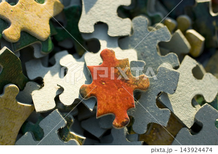 Jigsaw Puzzle Pieces Close-Up with Colorful Problem Solving Concept Jigsaw Puzzle Pieces Close-Up with Colorful Problem Solving Concept 143924474