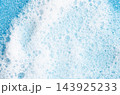 Soap foam or dish detergent on a sponge. 143925233