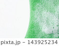 Soap foam or dish detergent on a sponge. Copy space 143925234