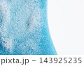 Soap foam or dish detergent on a sponge. Copy space 143925235