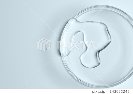 Testing a transparent cosmetic product in a Petri dish. 143925245