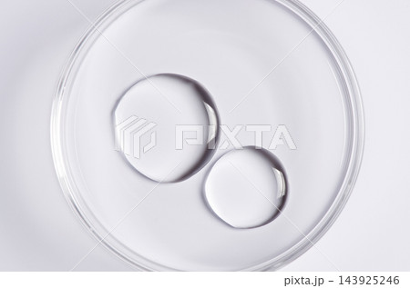 Testing a transparent cosmetic product in a Petri dish. 143925246