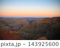 Grand Canyon red rock layers under a vibrant twilight sky 143925600