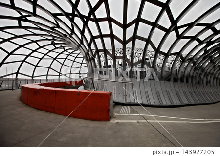Modern Pedestrian Bridge with Geometric Steel Architecture Modern Pedestrian Bridge with Geometric Steel Architecture 143927205