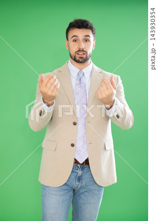 European man on green screen background speaks or addresses imaginary partner. 143930354