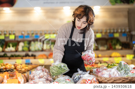 Eco food vegetable market, girl worker and bean. Eco food vegetable market, girl worker and bean. 143930618