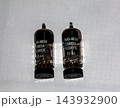Pair of Black Glass Vacuum Tubes Standing Side by Side 143932900