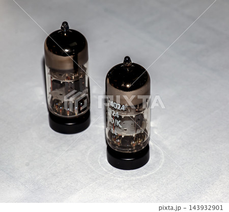 Angled View of a Pair of Vintage Silver Vacuum Tubes Angled View of a Pair of Vintage Silver Vacuum Tubes 143932901
