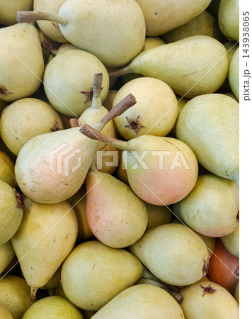 Fresh Ripe Pears Background at Food Market Fresh Ripe Pears Background at Food Market 143938065