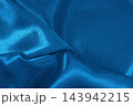 Blue fabric cloth texture for background and design art work, beautiful crumpled pattern of silk or linen. 143942215