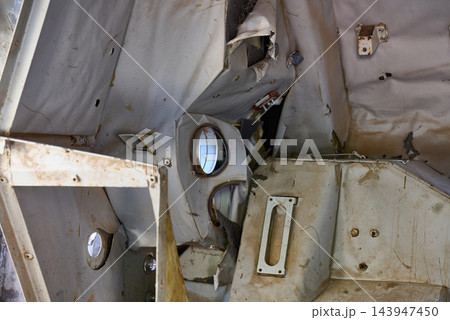 The interior space of an MT-LB armored personnel carrier hull, along with damaged metal parts 143947450