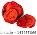 Crispy roasted carrot chips with sea salt, isolated on white background. Healthy and crunchy natural vegetable snack. Clipping path. 143955866