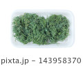 Dried dill in a white container, isolated on a white background. Cooking at home. Freeze-dried food. Top view. 143958370