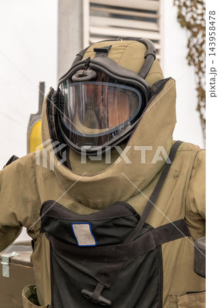 Specialized blast resistant equipment designed for protection during disposal of bombs, ammunition and other hazardous explosive devices. 143958478