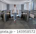 A blind woman rides an escalator in the subway. 143958572