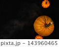 Pumpkins on black surface for autumn decoration and Halloween celebration 143960465
